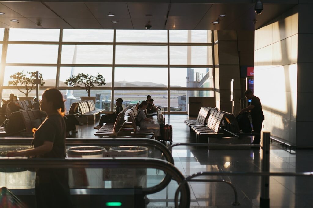 Airport Wi-Fi vs own data — traveler in terminal