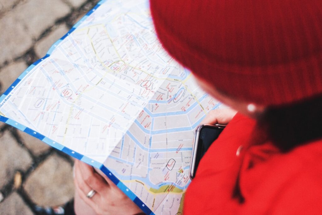 Day-one travel apps — traveler with phone map