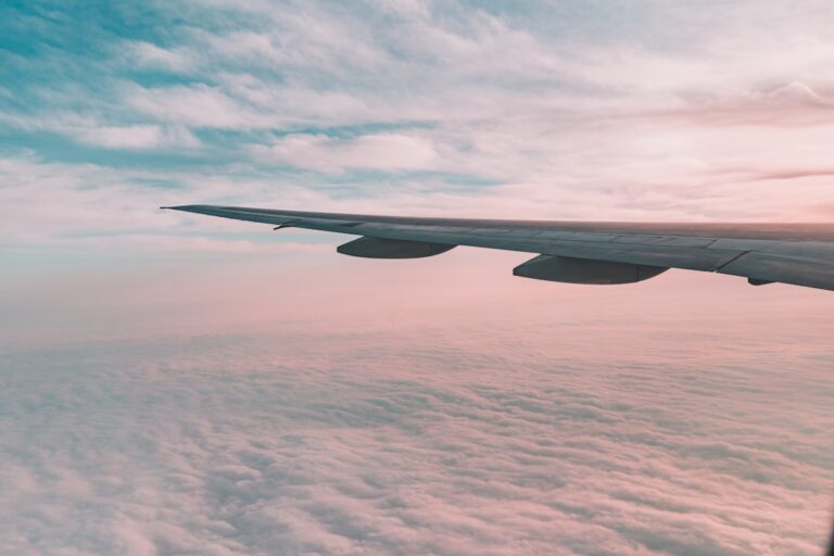 Global bundle — airplane above clouds